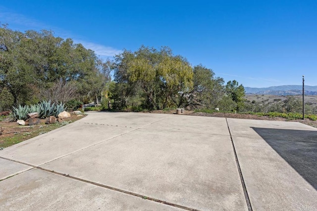 exterior space featuring a mountain view