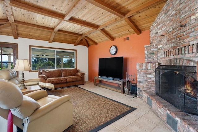 living room with visible vents, wood ceiling, vaulted ceiling with beams, a fireplace, and light tile patterned flooring