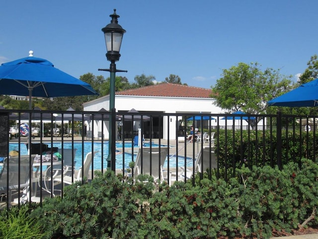 pool featuring fence