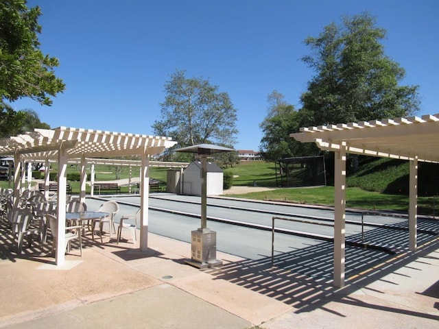 surrounding community featuring a pergola