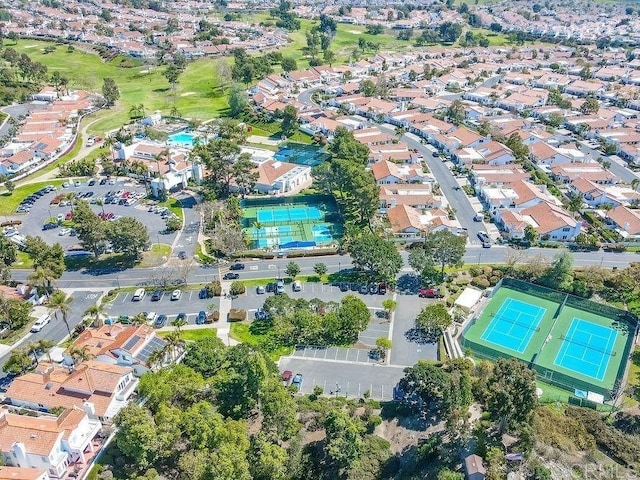 birds eye view of property with a residential view