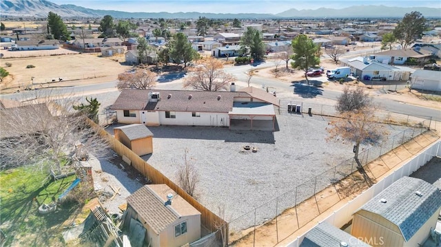 drone / aerial view with a residential view and a mountain view