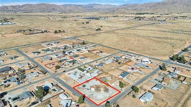 aerial view with a residential view and a mountain view