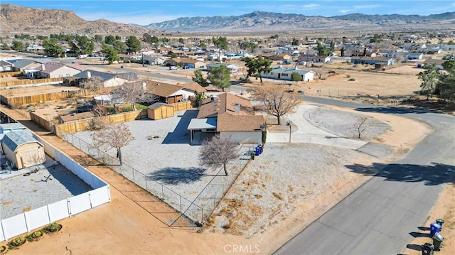 birds eye view of property featuring a residential view and a mountain view