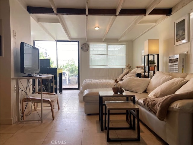 living area with beamed ceiling