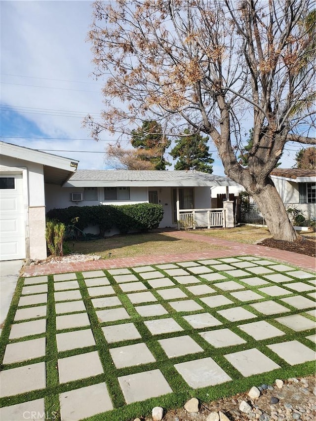 exterior space featuring a yard and stucco siding