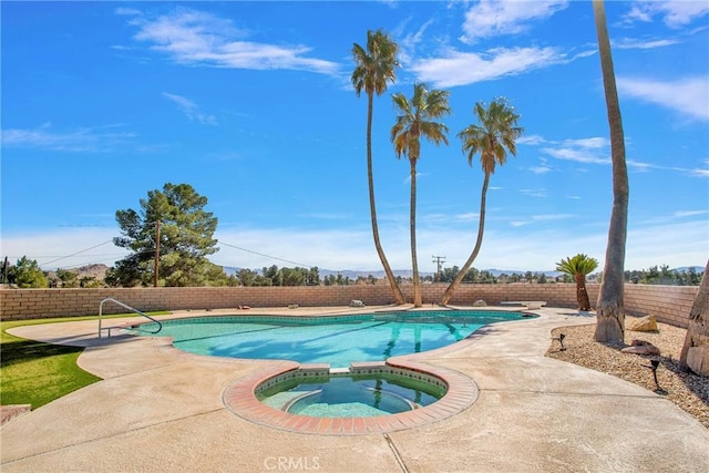 19459 Shasta Rd, Apple Valley, CA 92307 - view of swimming pool with a fenced backyard, a pool with connected hot tub, and a patio