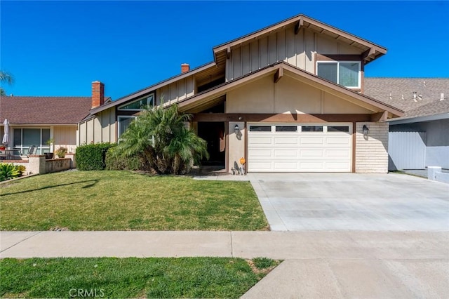 view of front of property with a garage, brick siding, driveway, board and batten siding, and a front yard