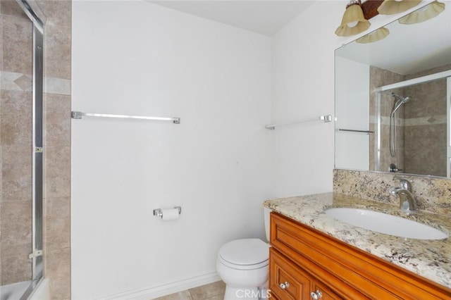 full bath with bath / shower combo with glass door, vanity, toilet, and tile patterned floors