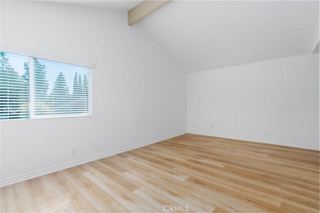 bonus room with light wood-style floors, vaulted ceiling with beams, and baseboards