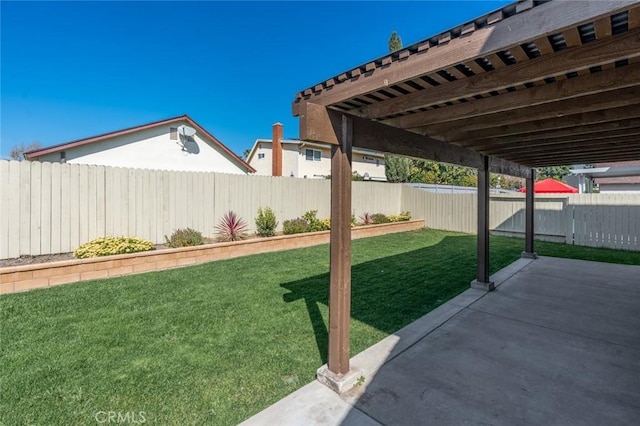 view of yard with a patio area and a fenced backyard