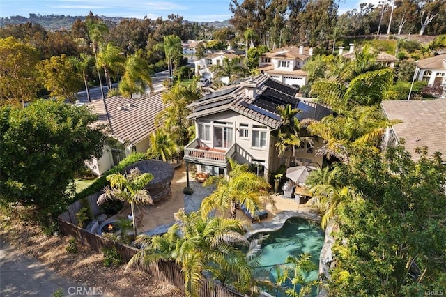 birds eye view of property with a residential view