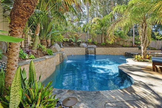 view of swimming pool featuring a fenced backyard and a fenced in pool