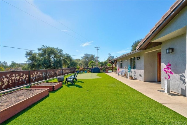 view of yard with fence