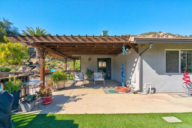view of patio featuring a pergola