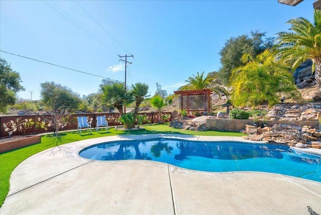 view of swimming pool with a fenced in pool, a patio area, a yard, and a fenced backyard