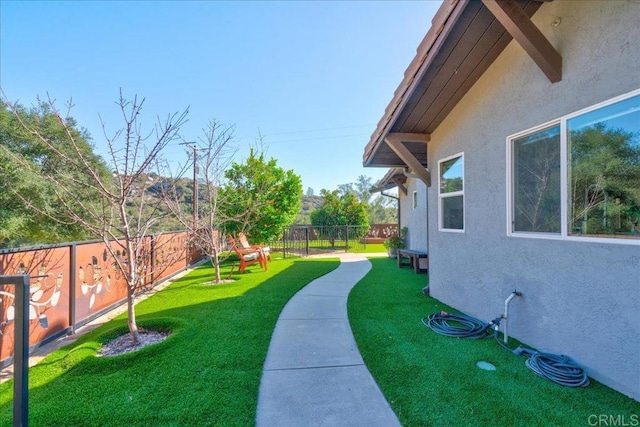 view of yard featuring a fenced backyard