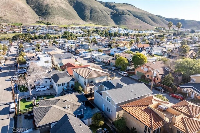 birds eye view of property featuring a residential view and a mountain view