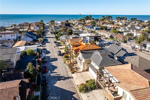 aerial view featuring a residential view and a water view