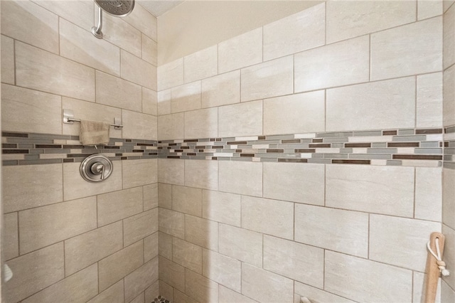 details with a tile shower