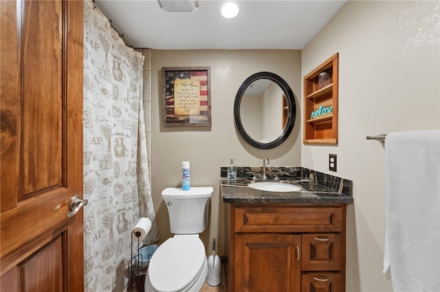 full bath with toilet and vanity