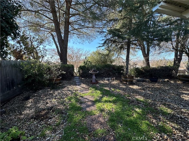 view of yard featuring fence