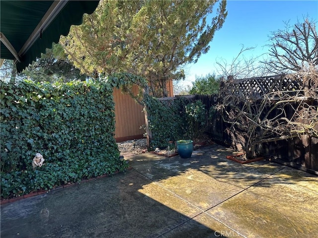 view of patio featuring a fenced backyard