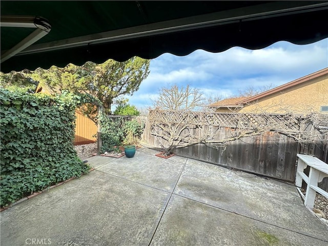 view of patio featuring a fenced backyard