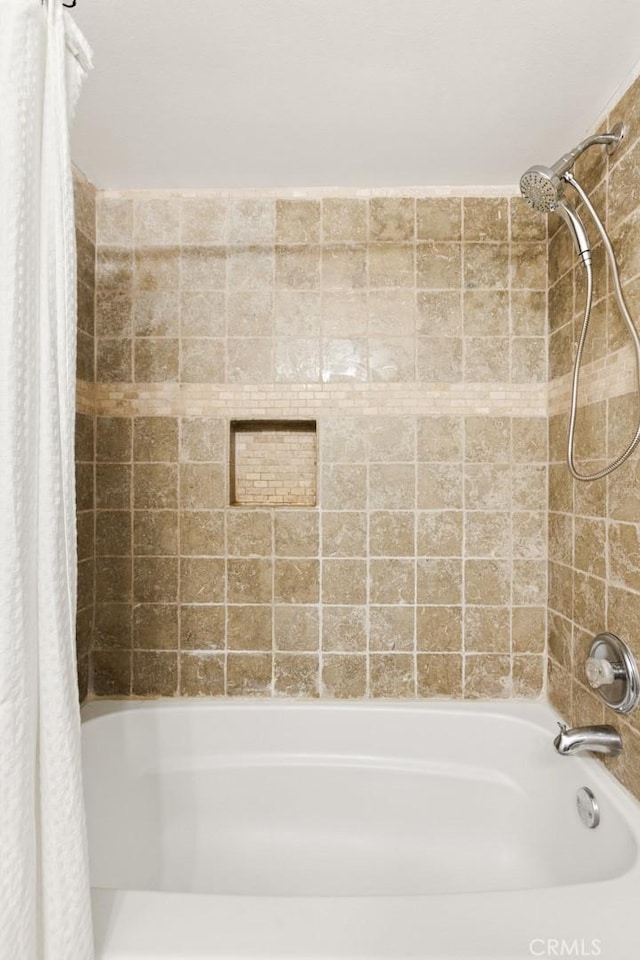 full bath featuring shower / bath combo