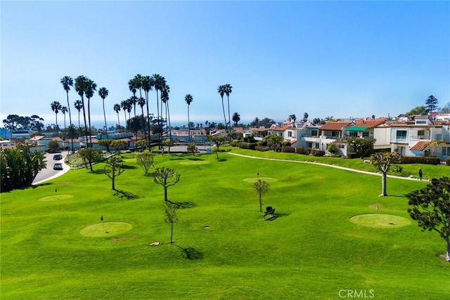 view of home's community featuring a residential view and golf course view