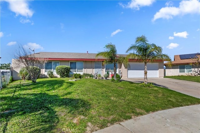 single story home featuring driveway, a garage, fence, a front yard, and stucco siding