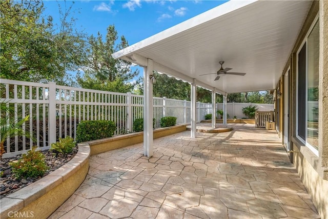 view of patio featuring ceiling fan and a fenced backyard