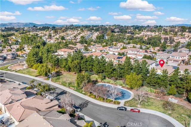 birds eye view of property with a residential view