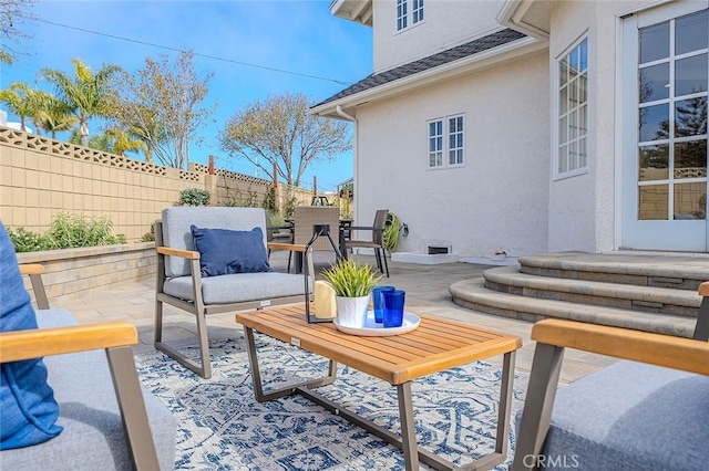 view of patio with fence