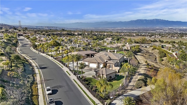 birds eye view of property with a residential view and a mountain view