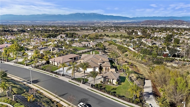 aerial view with a residential view and a mountain view