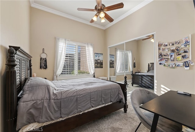 bedroom with baseboards, a ceiling fan, ornamental molding, carpet, and a closet