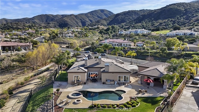 bird's eye view with a residential view and a mountain view