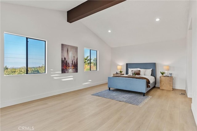 bedroom featuring light wood finished floors, beamed ceiling, recessed lighting, and baseboards