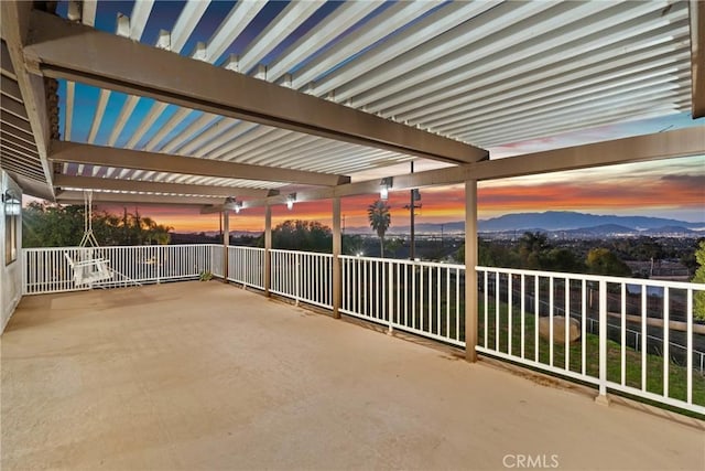 view of patio / terrace featuring a mountain view