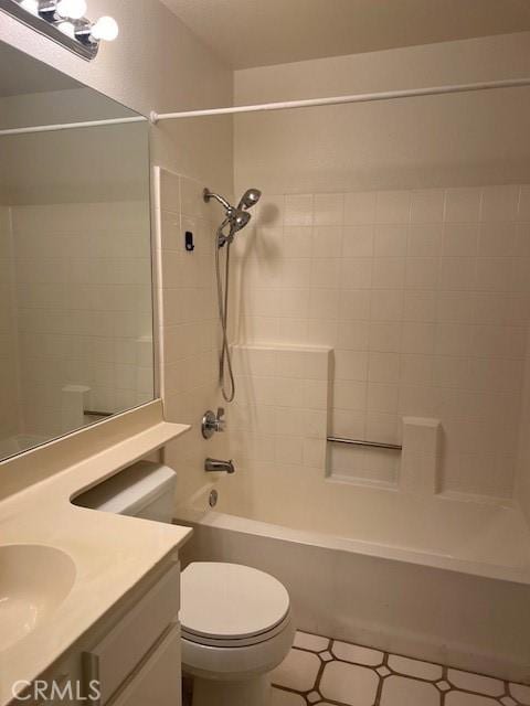 full bath featuring  shower combination, vanity, toilet, and tile patterned floors