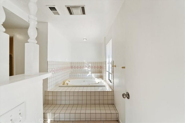 full bathroom featuring visible vents and a bath