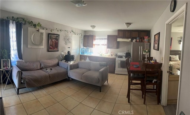 living area featuring light tile patterned floors