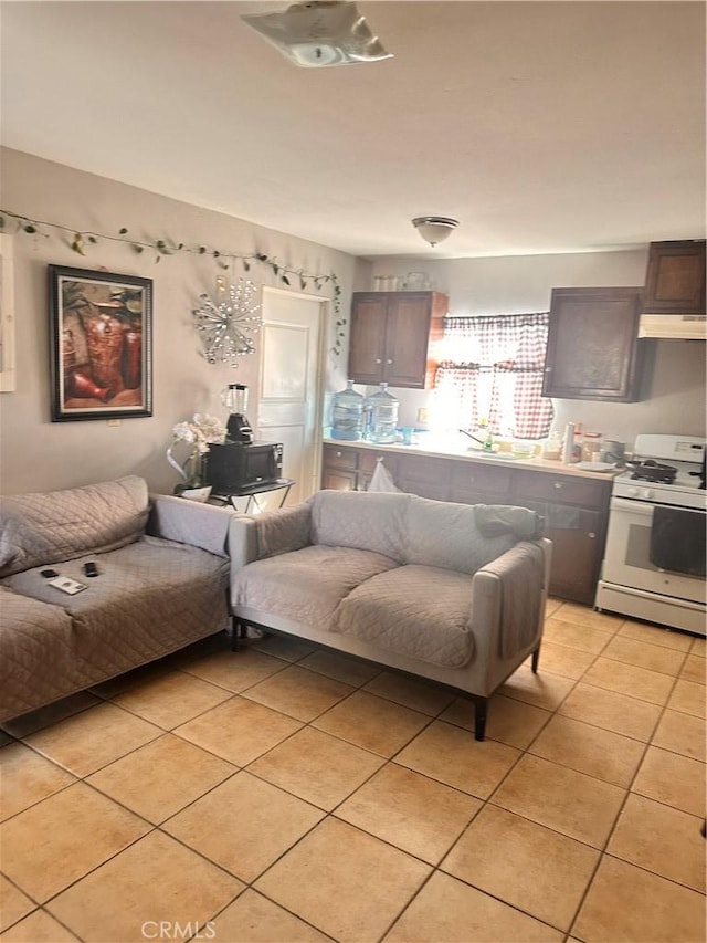 living area featuring light tile patterned floors