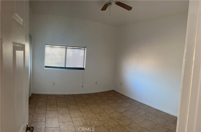 spare room with ceiling fan