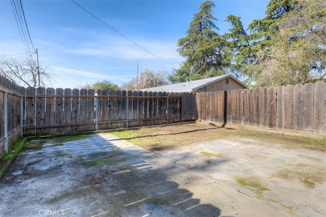 view of yard featuring a fenced backyard and a patio