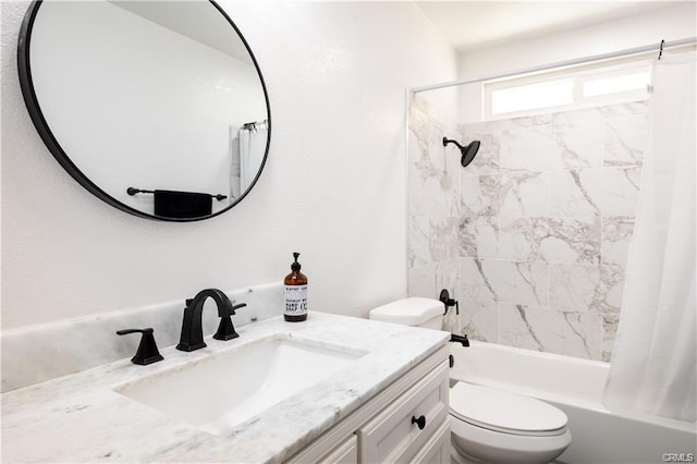 bathroom with toilet, shower / bath combination with curtain, and vanity