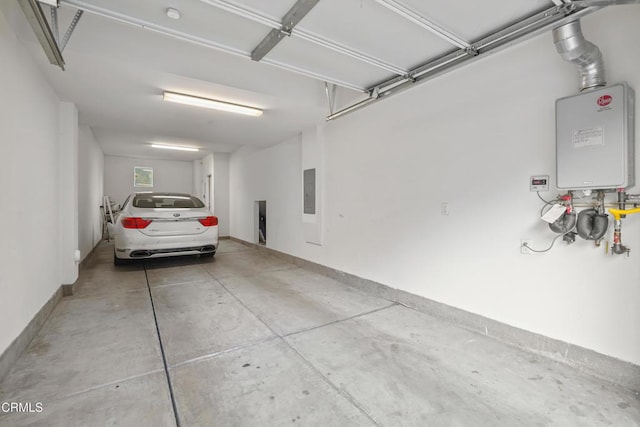 garage with electric panel, water heater, and baseboards