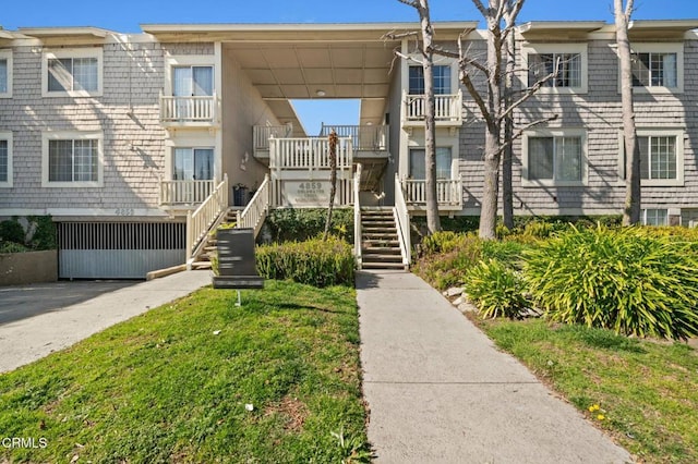 view of front of property with stairs