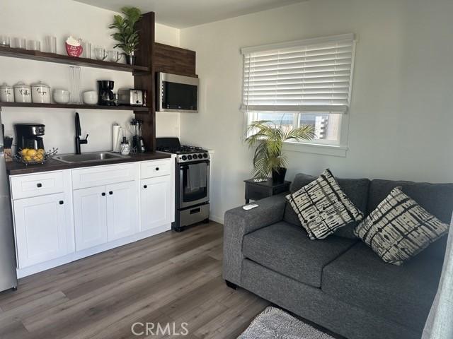 living room with wood finished floors